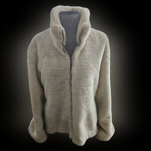 "Furry" faux fur short, light beige colored jacket with zipper front